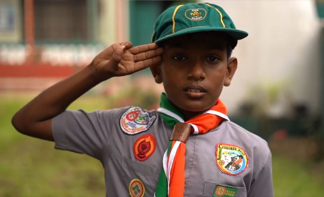 Scout Association member saluting